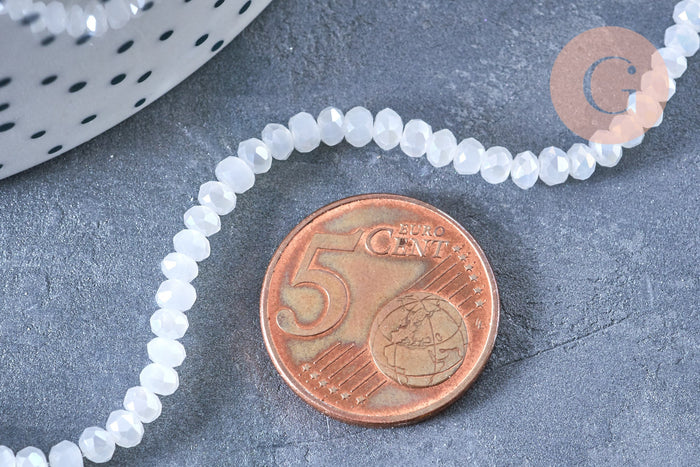 Perles toupies cristal blanc irisé 3.5x2.5mm, fil 25.4cm x1 (G6763)