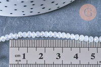 Perles toupies cristal blanc irisé 3.5x2.5mm, fil 25.4cm x1 (G6763)