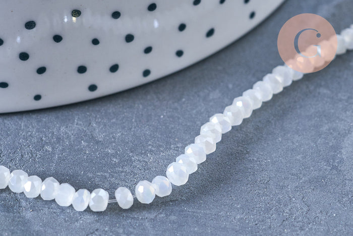 Perles toupies cristal blanc irisé 3.5x2.5mm, fil 25.4cm x1 (G6763)