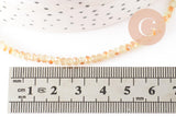 Perles toupies cristal jaune transparent irisé 3.5x2.5mm, x1 fil 38cm (G8593)