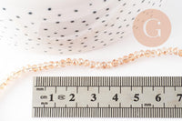 Perles toupies cristal orange transparent irisé 3.5x2.5mm, x1 fil 25cm (G8595)