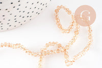 Perles toupies cristal orange transparent irisé 3.5x2.5mm, x1 fil 25cm (G8595)