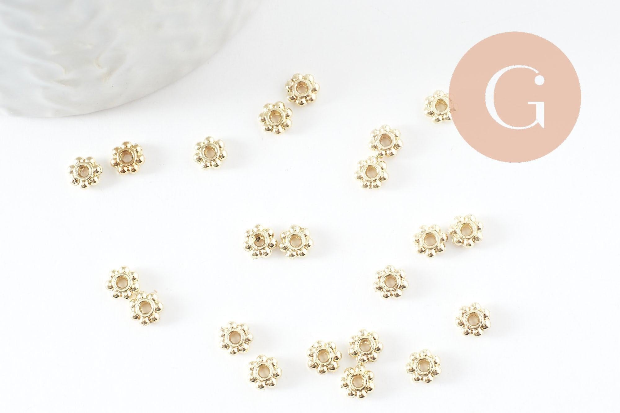 Rondelles fleurs intercalaires zamac doré 4mm, x20 (G9544)