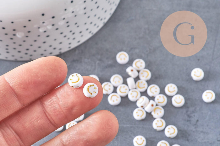 perle ronde smiley doré plastique blanc 7mm, x10 grammes (G4801)
