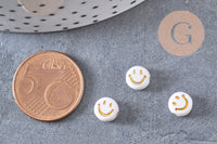 perle ronde smiley doré plastique blanc 7mm, x10 grammes (G4801)
