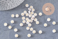 perle ronde smiley doré plastique blanc 7mm, x10 grammes (G4801)